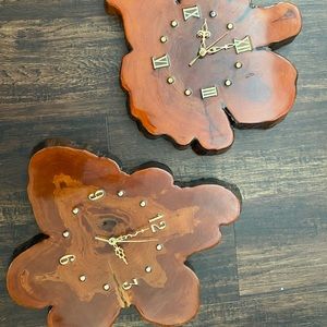 Pair of mid century cypress wall clocks